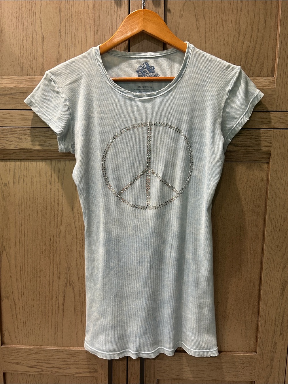 Heathered Light Blue Ribbed Crewneck Tee with Studded Peace Symbol